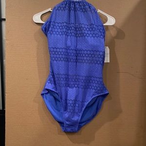 Blue swimsuit with laced up backing.